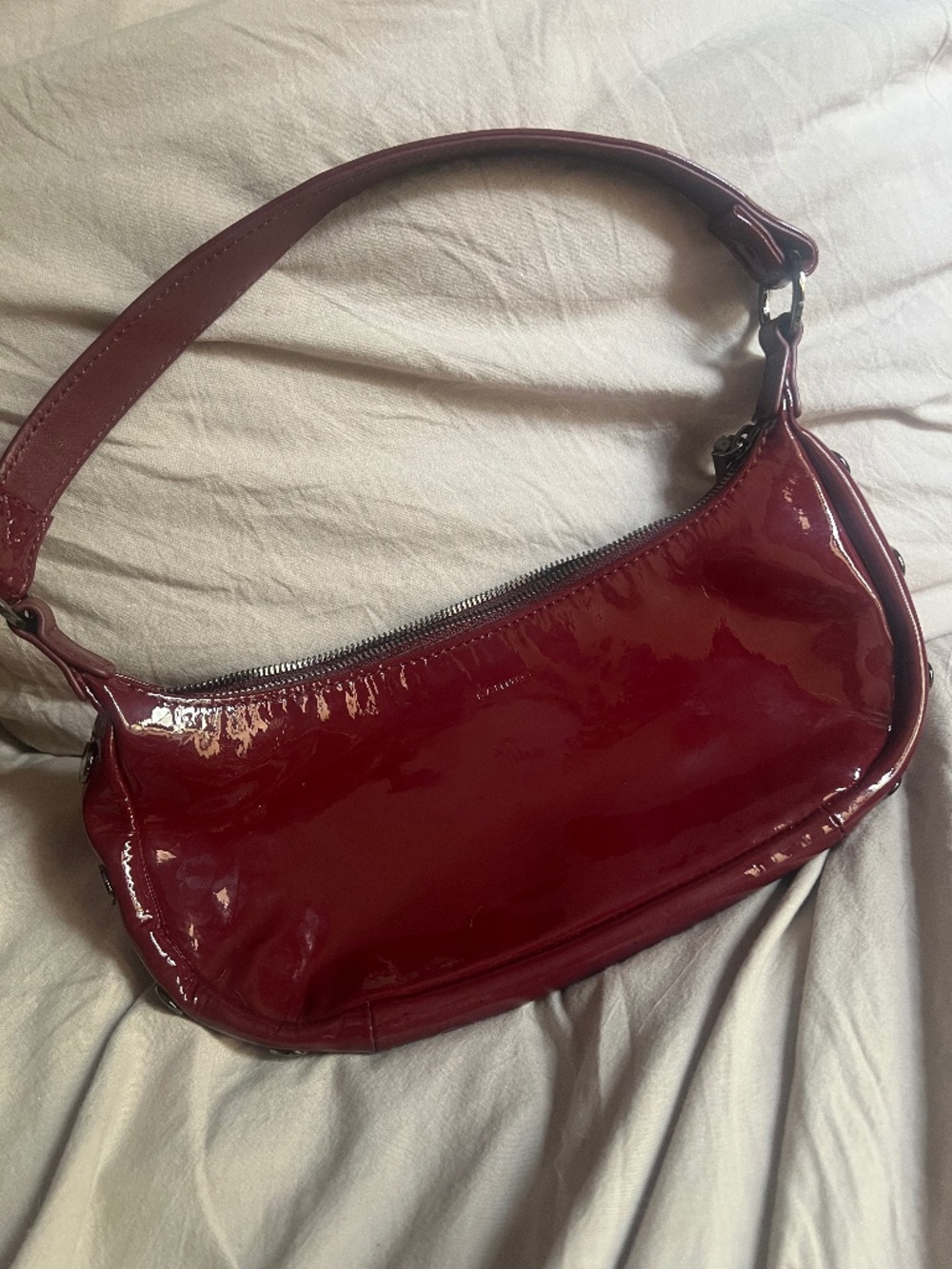Hammitt Becker baguette bag in the Pirouette Patent (burgundy/deep red)
